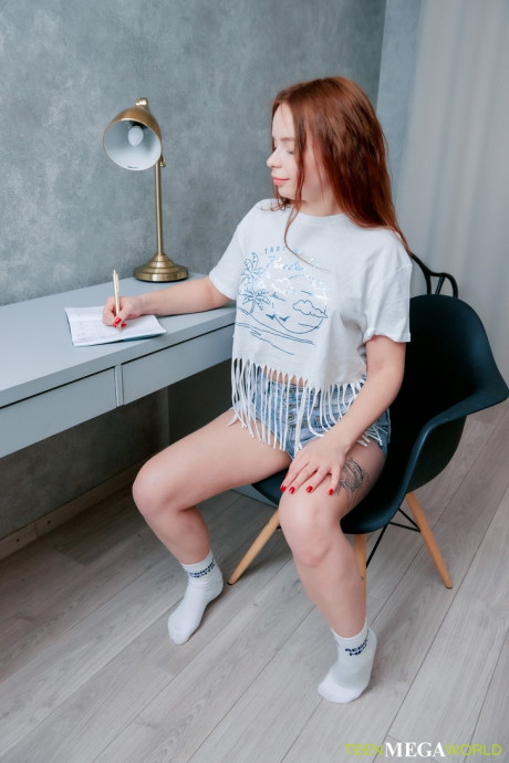 Fresh teenie ginger Luna Haze masturbates in her bedroom while wearing white socks