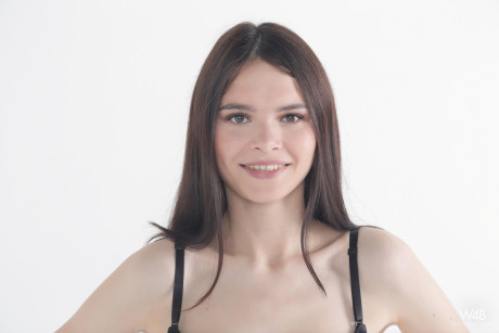 Lovely young babe Lilly bares her absolutely incredible body and holes