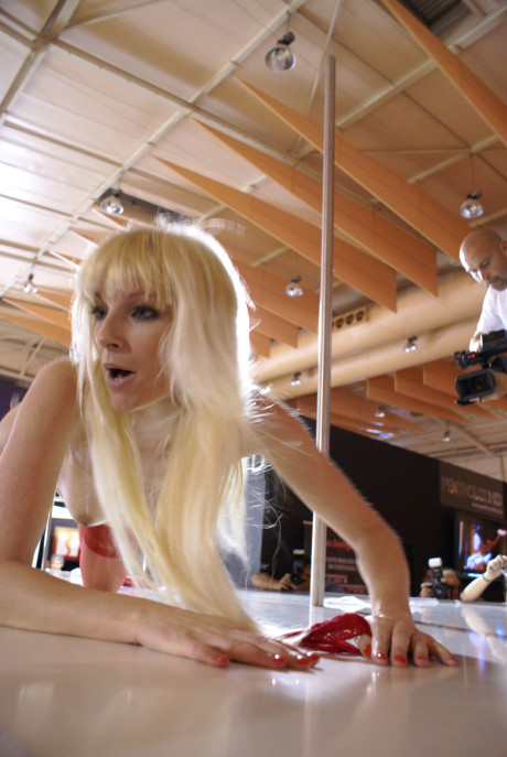 Blonde amateur dancer Lena Cova displays her stripping skills in pantyhose