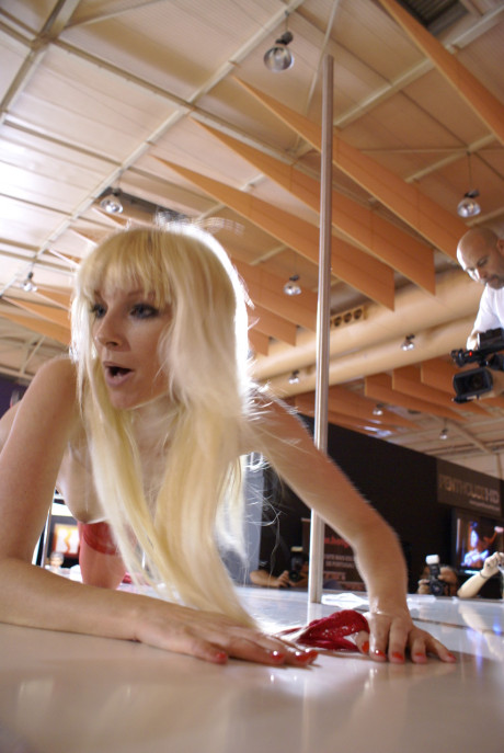 Blonde amateur dancer Lena Cova displays her stripping skills in pantyhose
