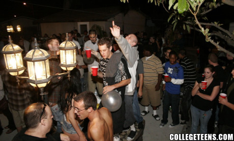 Two amateur babes lick giant rods and get rammed during a pretty party