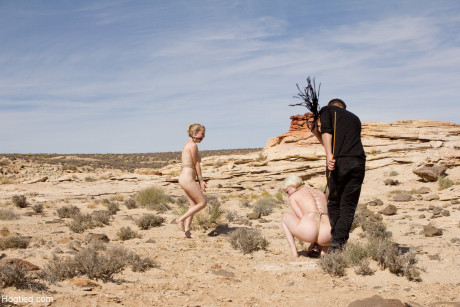 Hot blondes Penny Pax & Cherry Torn get paraded nude & tied up in the desert