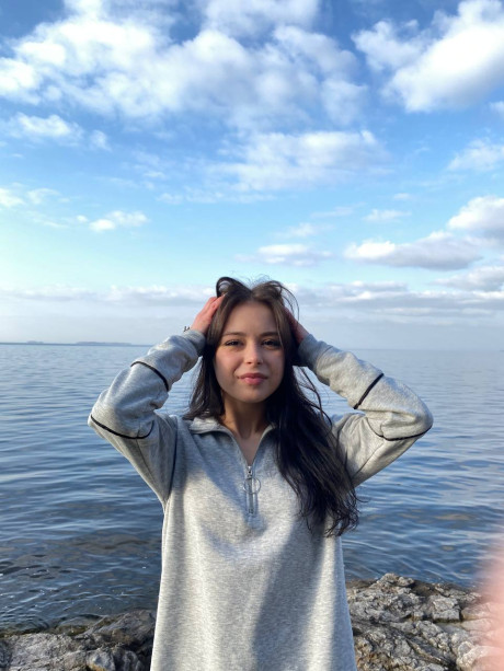 Ravishing sweet brunette young Molly Lo changes into a Wednesday Adams look