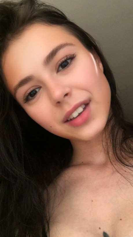 Ravishing sweet brunette young Molly Lo changes into a Wednesday Adams look