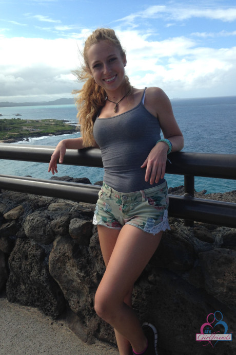 Amateur GF Taylor Whyte poses in a tight shirt & shorts by the sea