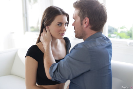 Brunette pornstar with astonishing butt Lana Rhoades mounts massive pole on a couch