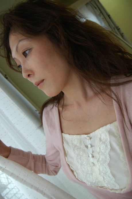 Brunette asian old lady Masako Suzuki reveals her enormous juggs and nice booty