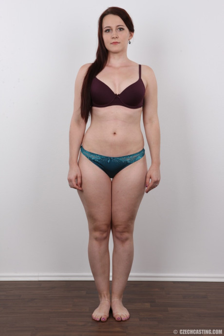 Fair skinned amateur Jana stands naked before taking a pause on a stool
