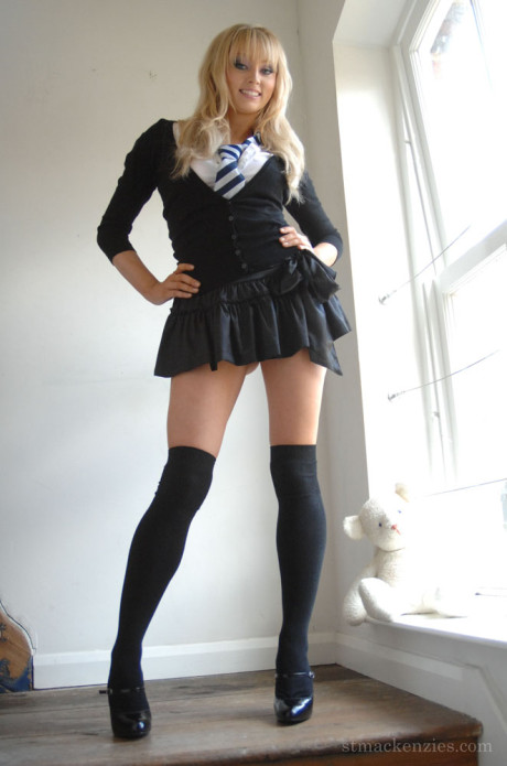 Hot blondy schoolgirl Elle Parker sheds uniform posing bare-breasted in lace panties