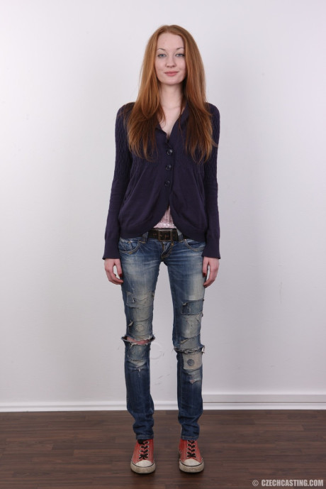 Natural red hair Klara doffs ripped jeans and a blazer on way to posing nude