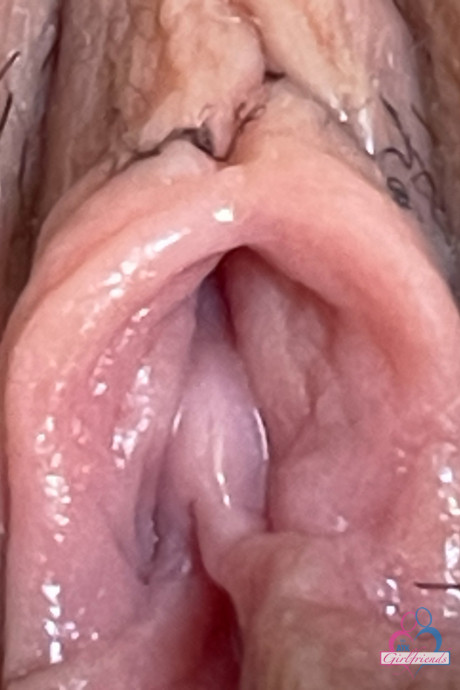 Teenage gf Lily Adams strips and flaunts her moist puffy cunt up close