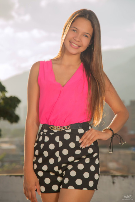 Teen hispanic Kiara Lorens shows her slender body and flaunts her booty and snatch