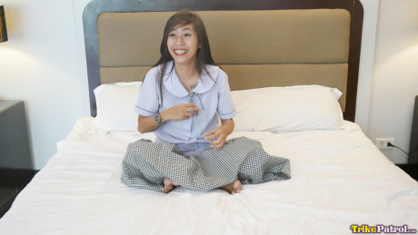 Slender Filipina amateur Erika Lopera strips and poses undressed in a hotel room