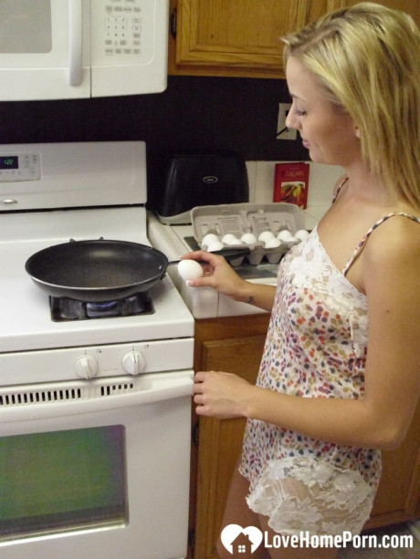 Beautiful sweet amateur ex-wife Katty West strips and shows her huge tits while cooking