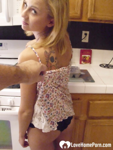 Beautiful sweet amateur ex-wife Katty West strips and shows her huge tits while cooking