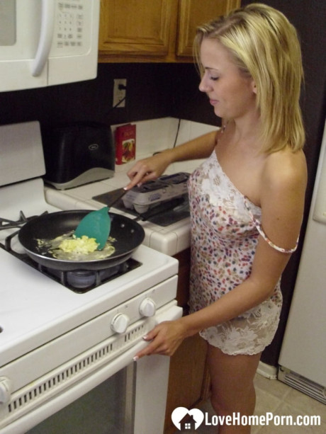Beautiful sweet amateur ex-wife Katty West strips and shows her huge tits while cooking