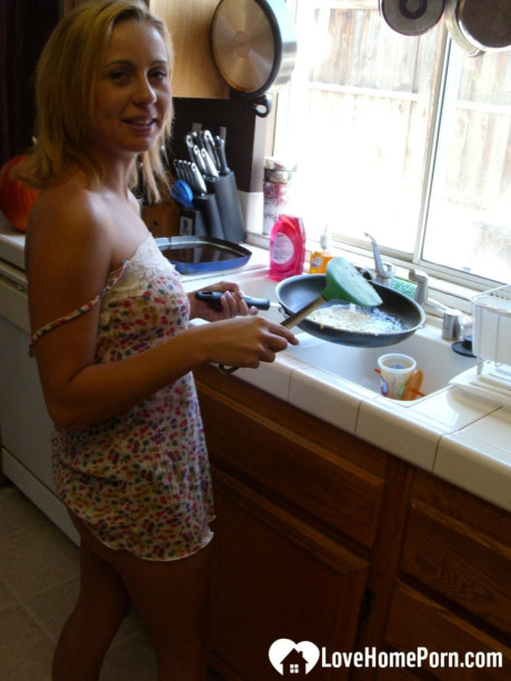 Beautiful sweet amateur ex-wife Katty West strips and shows her huge tits while cooking