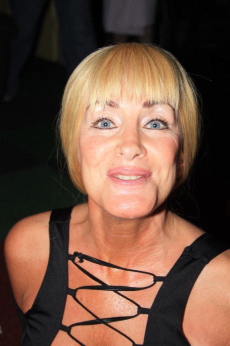 Blondie older with blue eyes Lola G enjoys a sultry swingers party on a bed