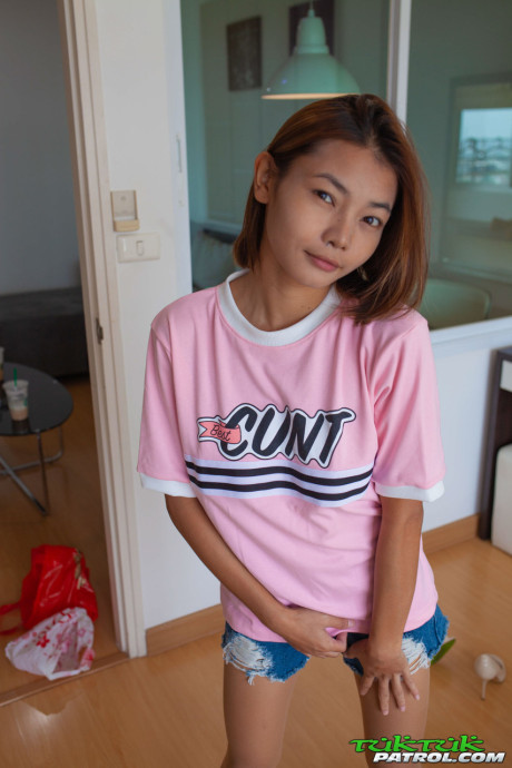Amateur Thai babe Barbie displays her petite body and touches her vagina