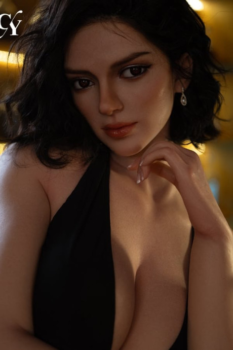 Pretty brunette sex doll in ebony dress and heels flaunting her perfect melons