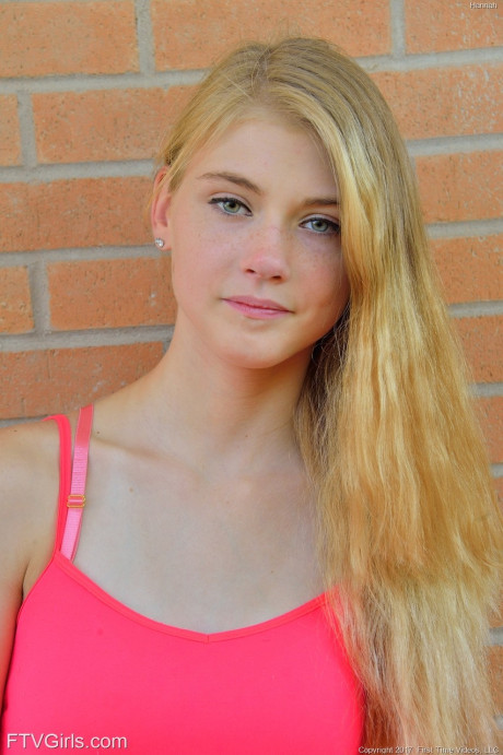Slim blondy teen Hannah exposes her shaved twat and butt in public