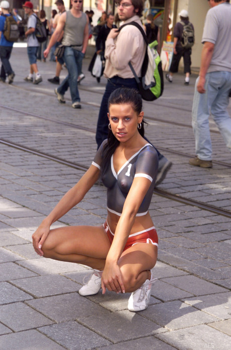 Teen solo slut girl woman Madison models in public while wearing body paint only