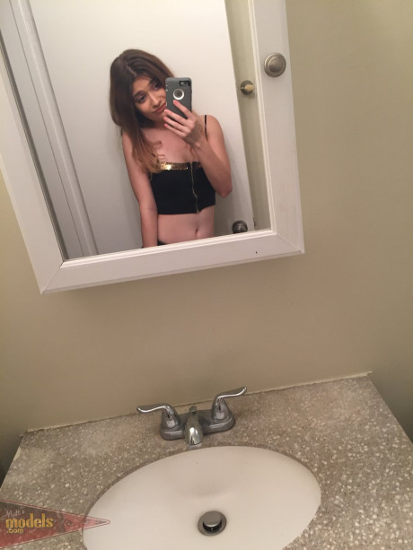 Skinny young Ariel Mc Gwire makes her naked modeling debut in bathroom selfies