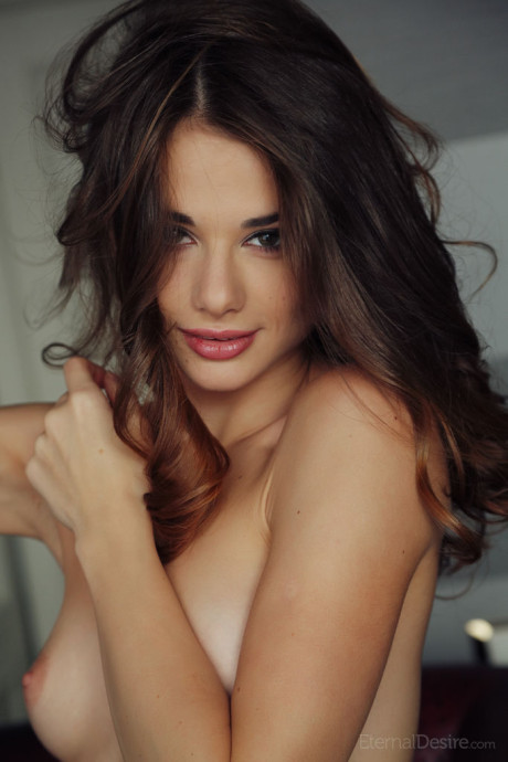 Fresh teenie beauty Loretta A puts her slender body on display upon a sofa