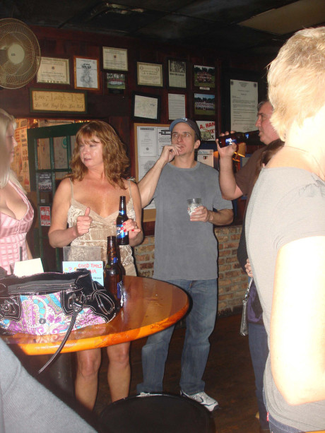 Charming amateur wives show off their huge boobies and pussies at a nightclub