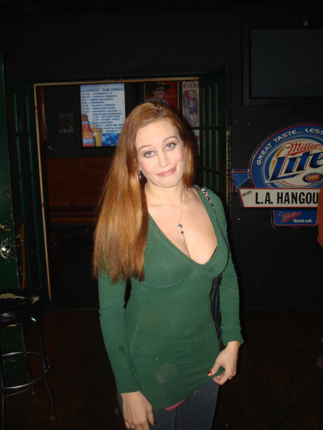 Charming amateur wives show off their huge boobies and pussies at a nightclub