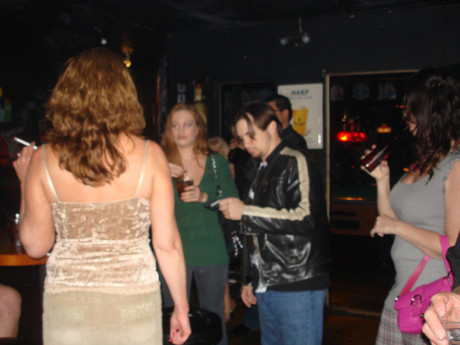 Charming amateur wives show off their huge boobies and pussies at a nightclub