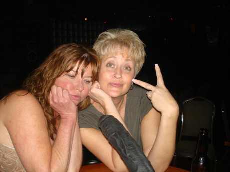 Charming amateur wives show off their huge boobies and pussies at a nightclub
