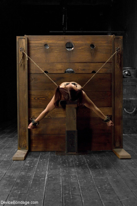 Red Hair MILF Josi gets her tight twat fisted in stock & pillory BDSM action