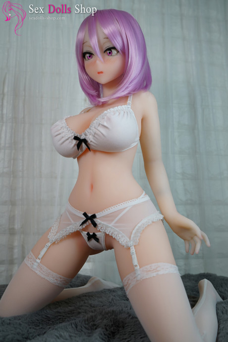 Purple-haired gigantic sex doll Akane B strips and shows her curvy body