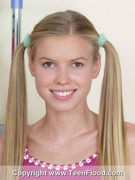 Young young looking blond Marketa makes her naked debut with her hair in pigtails