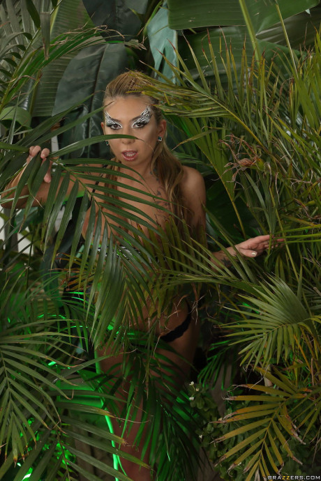 Petite latina Kat Dior shows her tits & flashes her cunt in a tropical setting