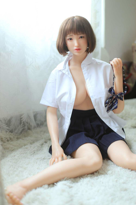 Brunette schoolgirl sex doll Chuxia flashes her hot ass & crotch in panties