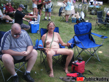 Amateur women go undressed and semi nude at a clothing optional party