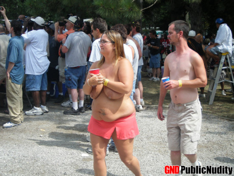 Amateur women go undressed and semi nude at a clothing optional party