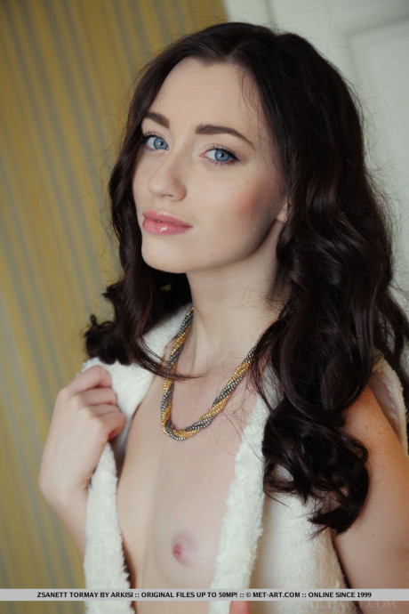 Beautiful brunette teen Zsanett Tormay revealing puffy pussy