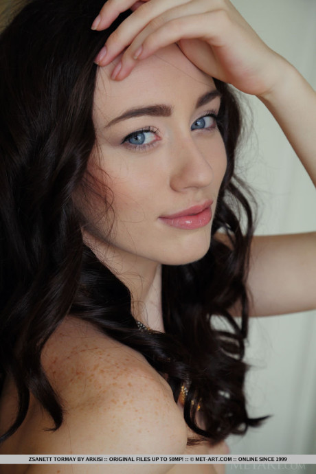 Beautiful brunette teen Zsanett Tormay revealing puffy pussy