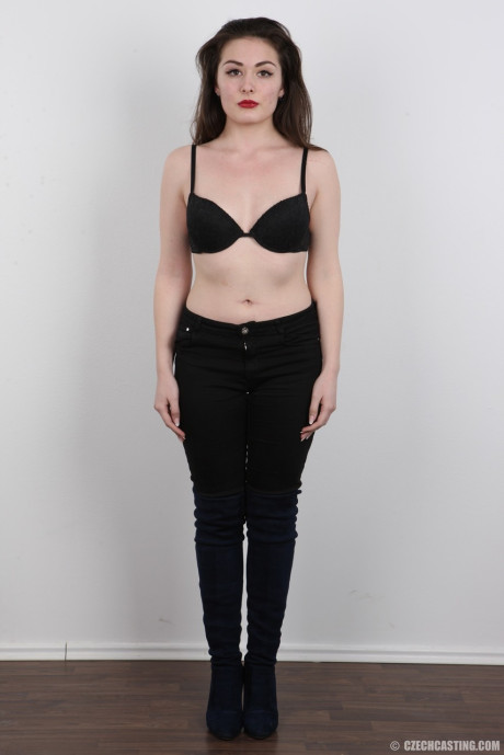 Brunette model Eva peels ebony panties and bra for a photo audition