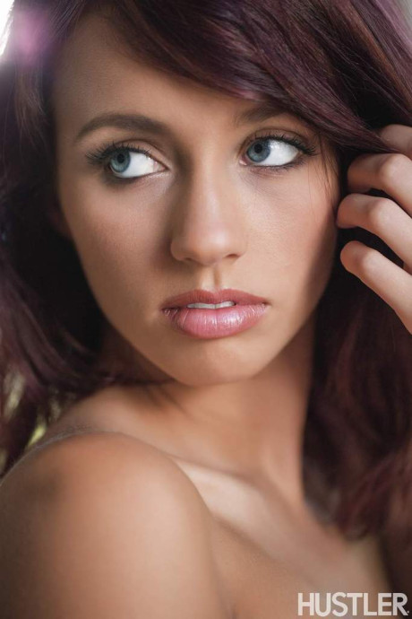 Beautiful red hair Victoria Lynn bares her firm boobs for undressed posing