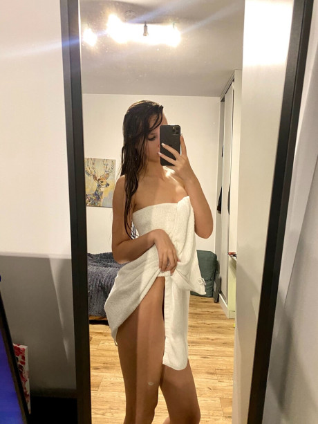 Hot skinny only fans babe flashes her ass while posing with a towel