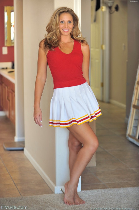 Fine delicious cheerleader Pamela fingers & toys her sexy shaved cunt