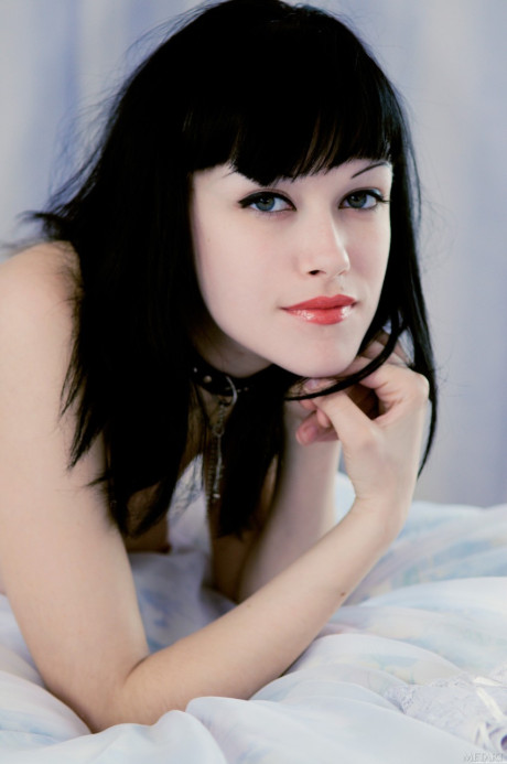 Raven-haired babe in white pantyhose Cecile A shows her hot tits & attractive muff