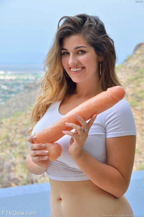 Sexy teen lady GF broad inserts a big dildo into her twat before self fisting