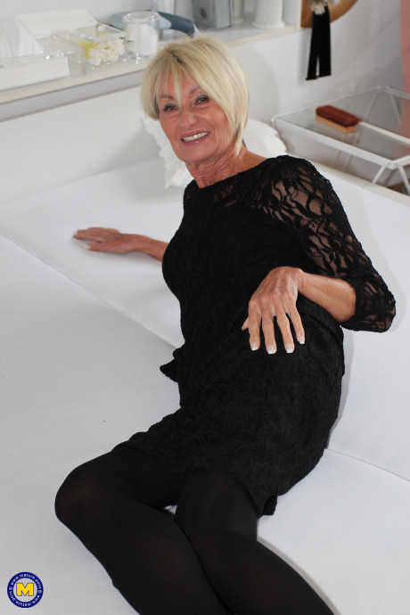 European older with freckles Franziska shows her body in a solo