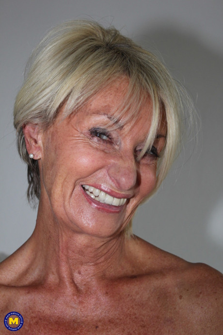 European older with freckles Franziska shows her body in a solo