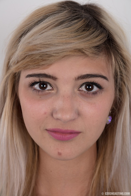 Young Karolina hopes to break into porn by peeling her short skirt to pose undressed